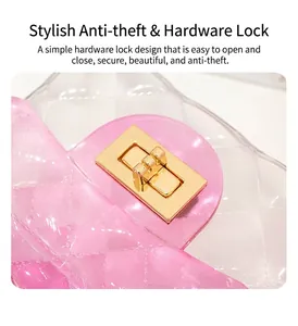 Close-up detail of the durable golden metal turn-lock on a transparent gradient jelly bag.