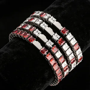 Detail view of four stainless steel tennis bracelets with red and white square zircons.