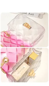Detail showing the interior capacity of a transparent pink gradient jelly handbag.