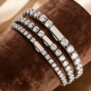Close-up of 316L stainless steel tennis bracelets with cubic zirconia in three widths.