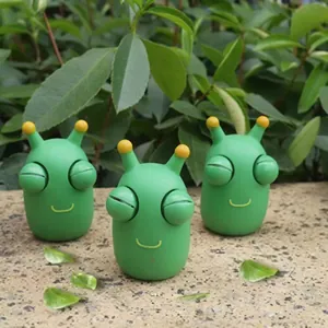 Three cute green cabbage worm squeeze toys with pop-out eyes for kids stress relief
