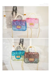 Fashionable mini transparent jelly handbag with gradient colors and pearl handle detail