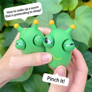 Funny green pop-eye worm squeeze toy for stress relief and sensory play.
