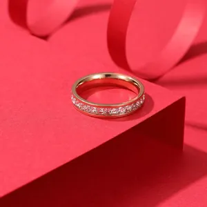 Rose gold stainless steel eternity ring with shimmering square cubic zirconia stones