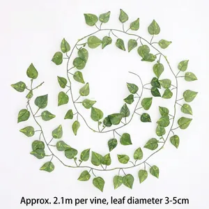 Close-up view of a 2.1m artificial green pothos ivy garland with detailed leaves