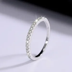 Close-up detail of S925 sterling silver eternity band ring with D color moissanite