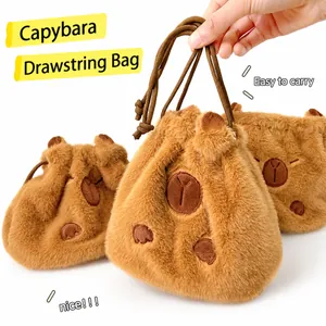 Close-up of cute capybara plush drawstring bags with soft furry texture