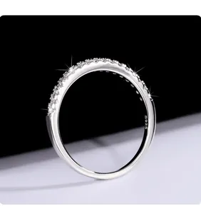 Close-up of S925 sterling silver moissanite stackable band ring with sparkling stones