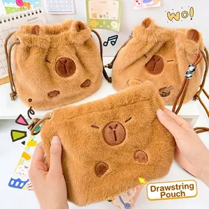 Close-up view of a fluffy brown Capybara plush drawstring bag with cute embroidered face