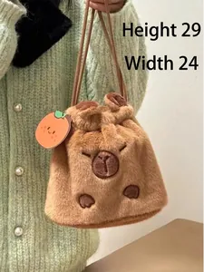 Detailed view of brown Capybara plush shoulder bag with cute orange tag accessory