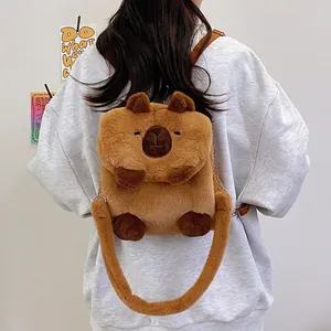 Cute brown capybara plush backpack worn by a model, 30x30cm cartoon animal bag.