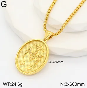 Close-up of a retro gold stainless steel oval pendant with a religious cross design.