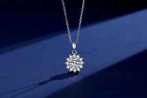 Close-up of S925 sterling silver sunflower pendant with sparkling moissanite