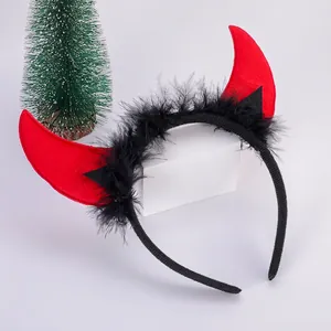 Halloween devil horn headband with black feather trim and red horns for party wear