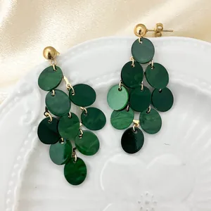 Elegant minimalist green tiered disc drop earrings with gold studs for luxury party wear