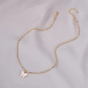 Elegant gold-plated butterfly pendant necklace with sparkling rhinestone chain detail