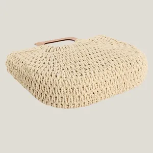 Handmade woven paper rope beach bag with minimalist wooden handles for summer style