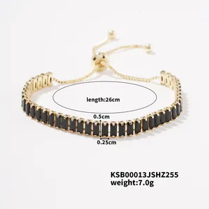Gold-plated tennis bracelet with black zircon stones showing 26cm length dimensions.