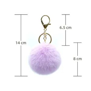 Soft purple 8cm faux fur pom-pom keychain with gold-tone metal hardware