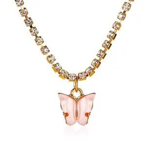 Elegant gold-plated tennis necklace with clear rhinestones and pink butterfly pendant