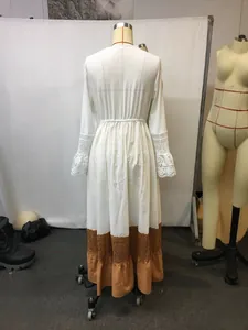 Elegant white V-neck lace flared sleeve maxi dress with pleated patchwork detail