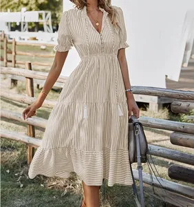 Elegant beige striped V-neck dress with puff sleeves and tassel waist tie