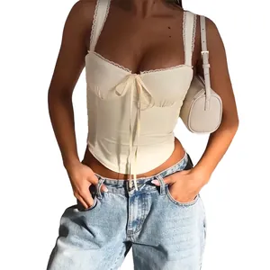 Elegant cream lace trim camisole top with front bow tie detail and slim fit design