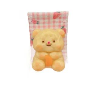 Kawaii yellow butter bear squishy toy slow rebound stress relief toy in pink bag