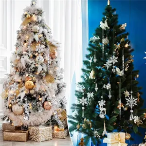 Detailed view of silver snowflake and icicle ornaments on a festive Christmas tree.