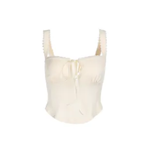 Elegant cream lace trim camisole top with ribbon bow detail in a slim fit design
