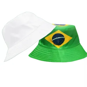 Detailed view of a green Brazil flag print bucket hat and a plain white cotton hat.