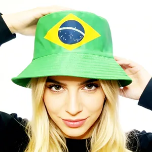 Close-up view of a vibrant green bucket hat featuring the Brazil flag design on a model