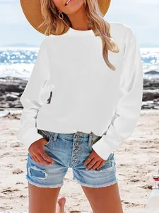 Casual women's loose solid white long sleeve crewneck sweatshirt for autumn wear