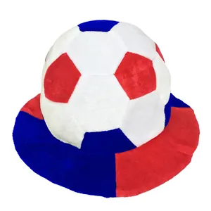 Detail view of a soft plush soccer ball themed fan hat with a red and blue brim