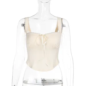Elegante top a canotta in pizzo crema con fiocco e design slim fit per donna