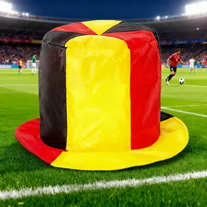 German flag colored tall top hat for football soccer fans displayed on stadium grass field