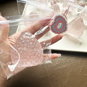 Jouet squishy fraise rose pailleté kawaii pour soulager le stress avec effet de rebond