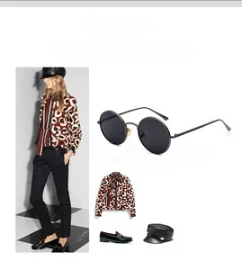 Retro round metal frame sunglasses styled with a chic fashion outfit for a lifestyle look