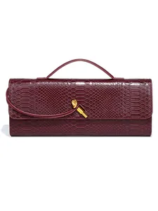 Elegant burgundy snake pattern clutch bag with unique gold knot metal clasp detail