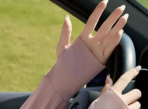Detail view of light pink ice silk sun protection sleeves for driving and UV protection