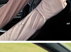 Close-up of pink ice silk sun protection sleeves with fingerless design for driving use