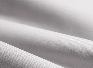 Macro view of breathable white ice silk fabric for cooling sun protection sleeves