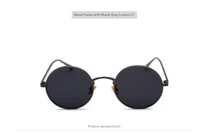 Retro round metal frame sunglasses with black grey lenses and punk style aesthetic