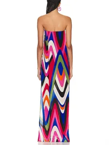Elegant strapless maxi dress featuring a vibrant multi-colored wave pattern print