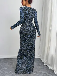 Detailed back view of a slim-fit blue leopard print mesh maxi dress highlighting the texture