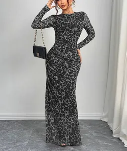 Detail of elegant leopard print sheer mesh long sleeve maxi dress with ruched waist