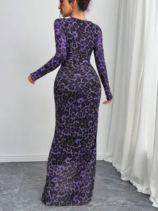 Detailed back view of a slim-fit purple leopard print mesh long sleeve maxi dress