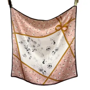 Elegant 65x65cm pink floral mulberry silk square scarf featuring a chic bow design