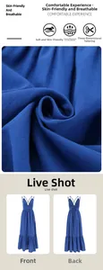 Detailed view of blue cotton linen maxi dress with V-neck and tiered skirt design