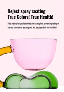 Close-up of pink heat-resistant glass cup with green cloud-shaped saucer